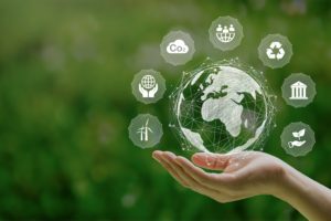 ESG icon concept in the woman hand for environmental, social, and governance by using technology of renewable resources to reduce pollution and carbon emission . in sustainable and ethical business on the Network connection.